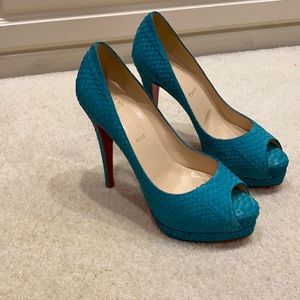 Teal color snakeskin rare color and worn once